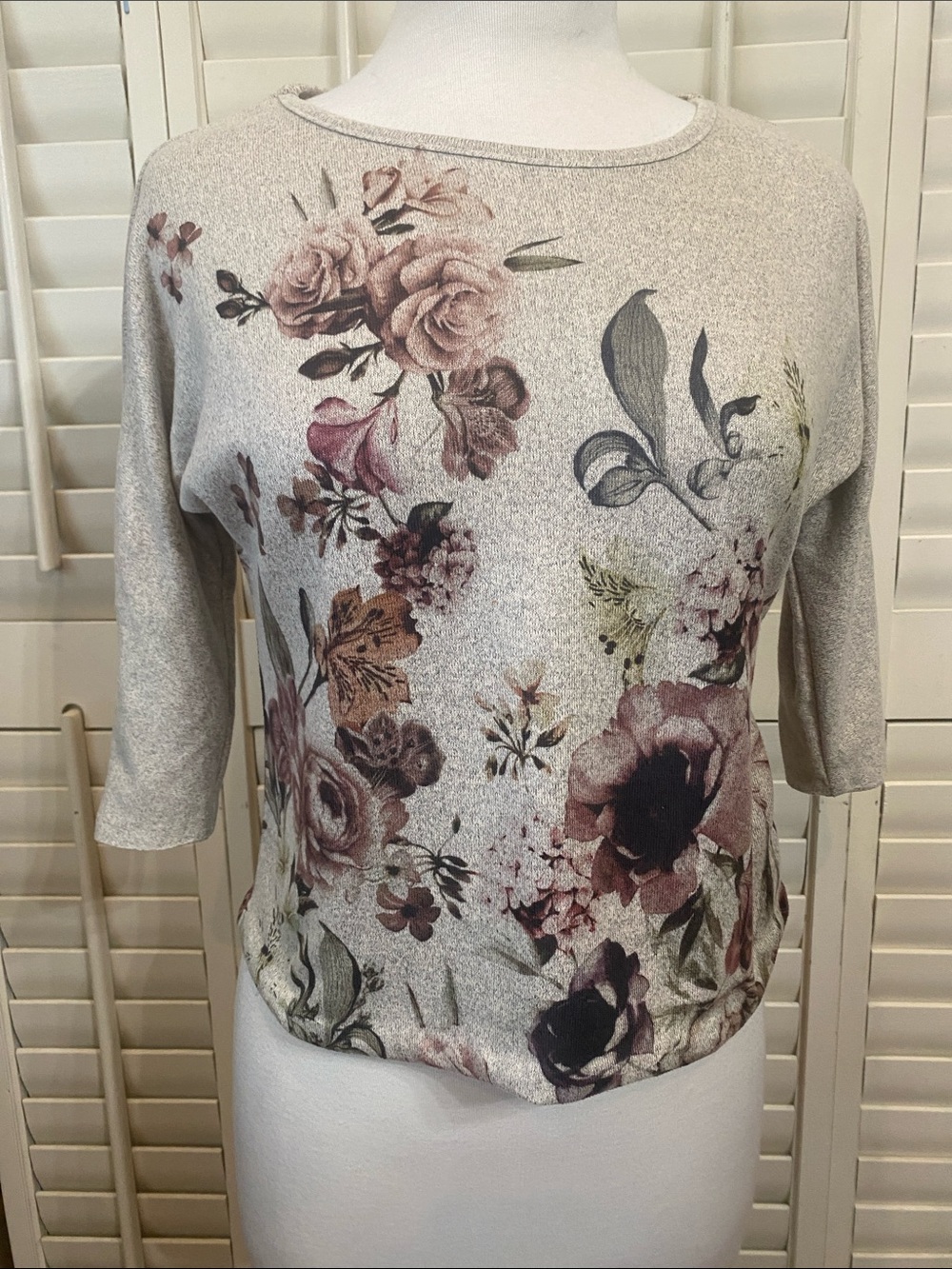 Misia Beige floral beteau neckline top with 3/4-length sleeves $125 retail.